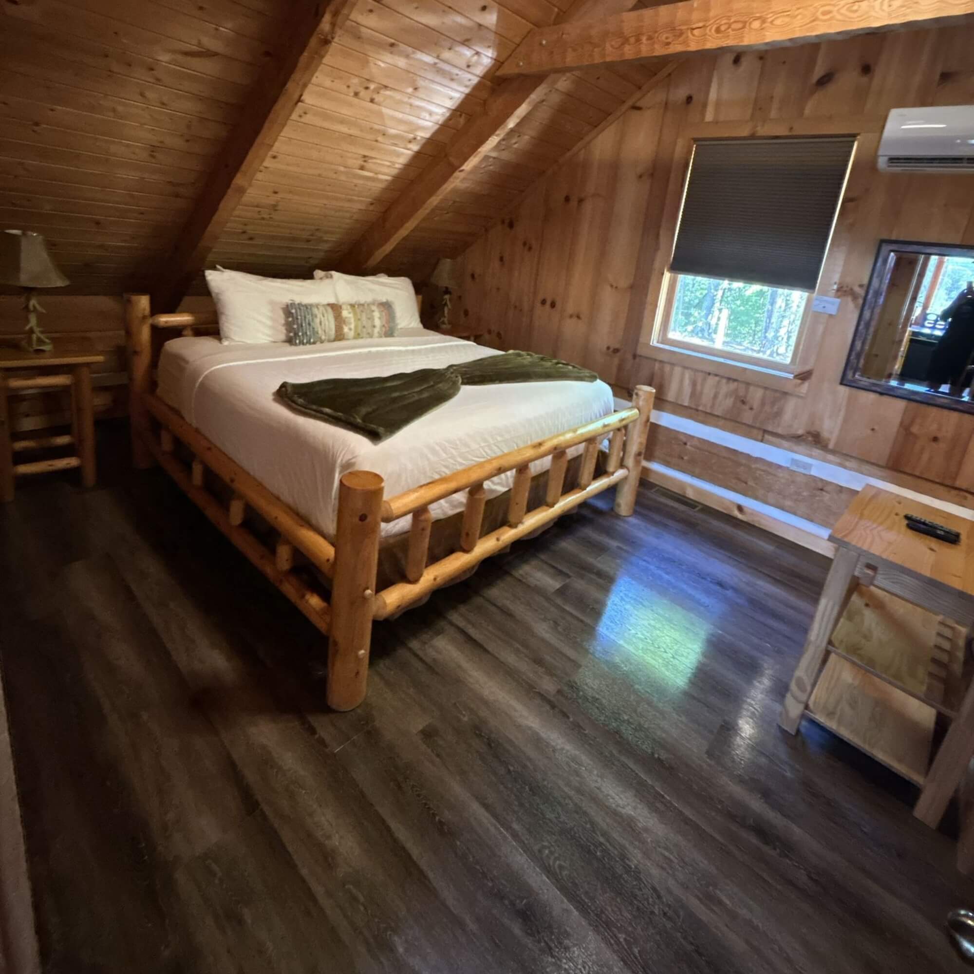 Professional deep cleaning of a rustic cabin in Sevierville, TN, showing a clean wooden interior and spotless fireplace.