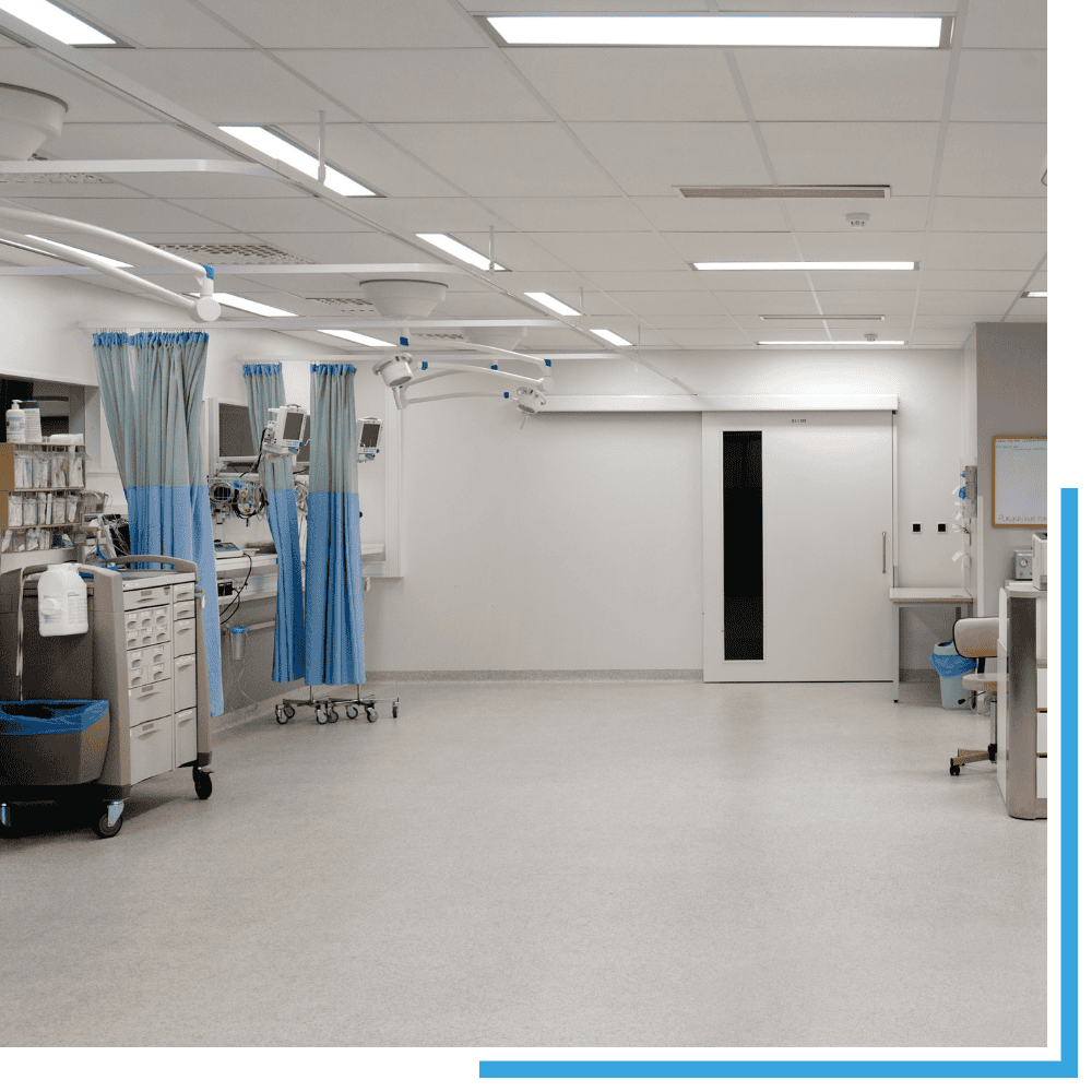 A cleaning professional disinfecting seating in a Sevierville clinic waiting room as part of specialized clinic cleaning services.